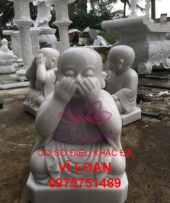 Tượng chú tiểu vui vẻ