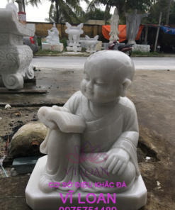 Tượng chú tiểu vui vẻ